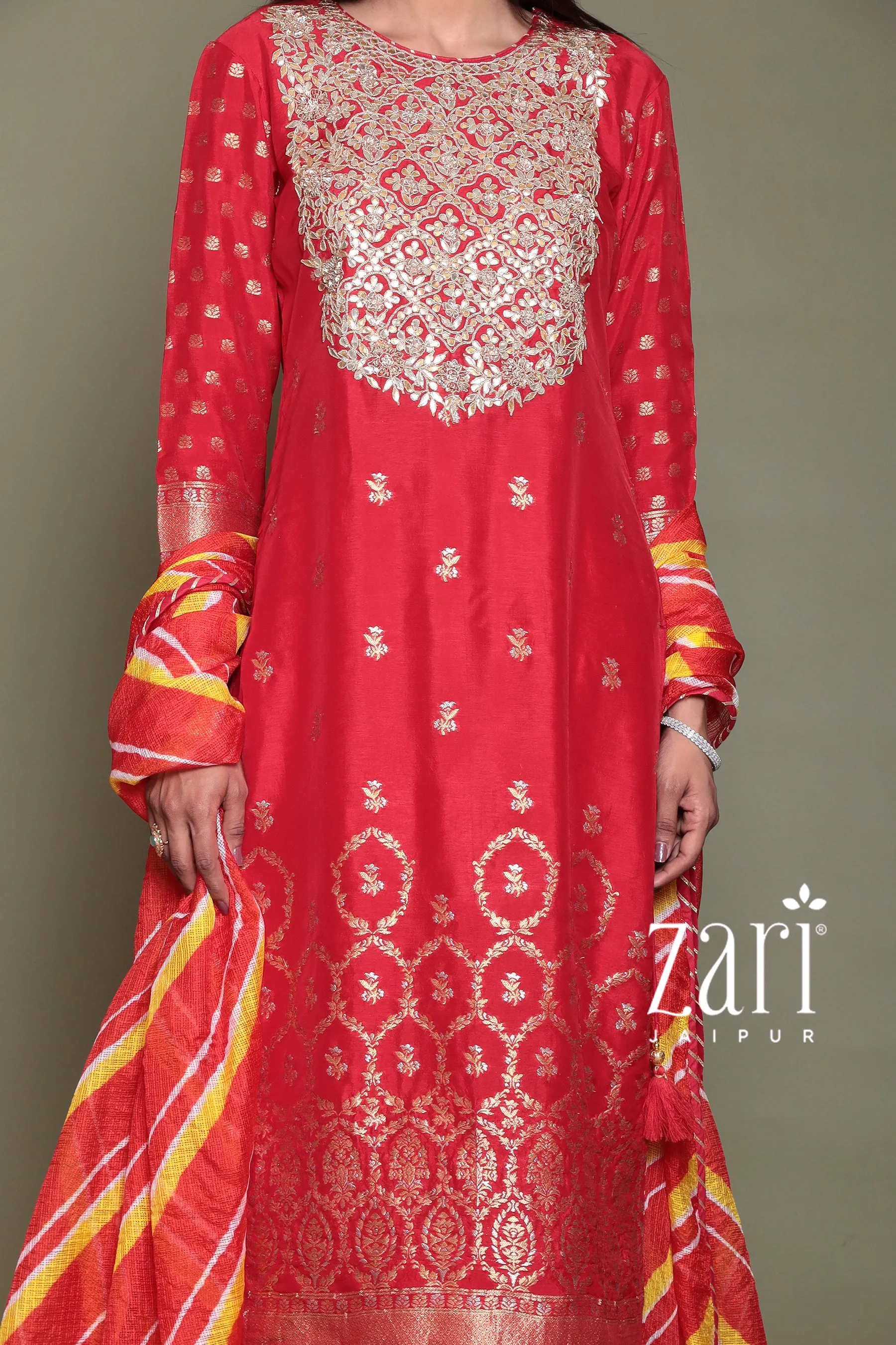 Banarsi Silk Suit with Aari, Gota Patti, Pearl, Zardozi work.