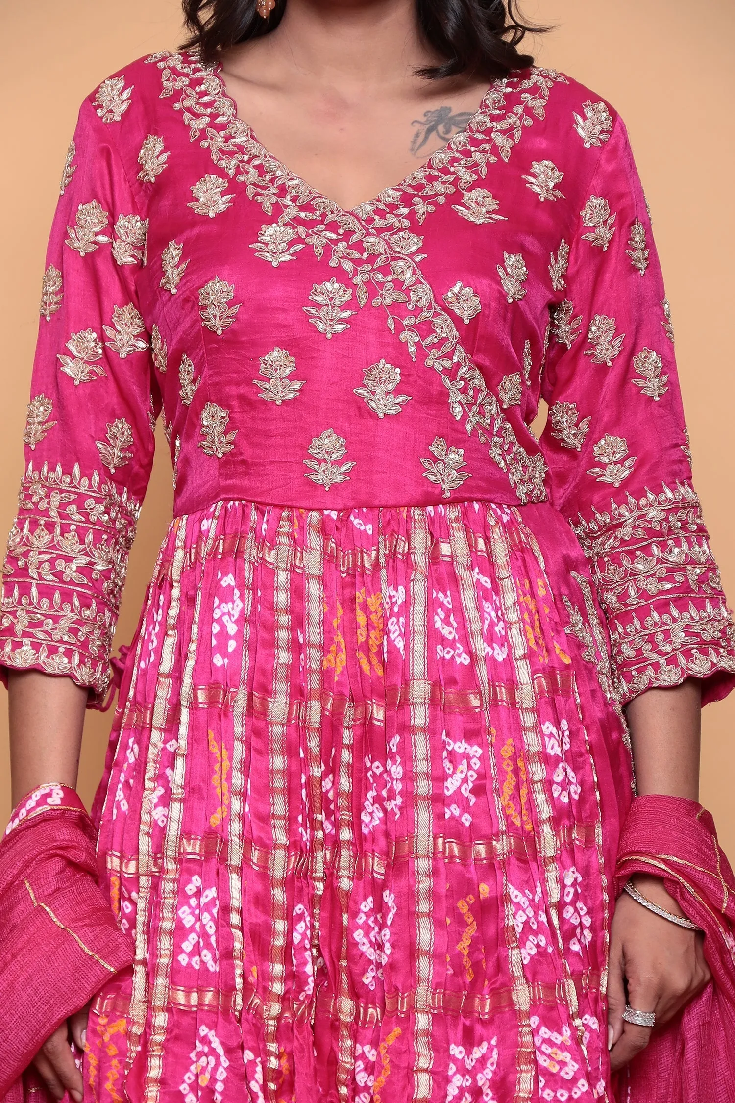 Bandhej ghatchola peplum kurta with skirt and zardozi embroidery.