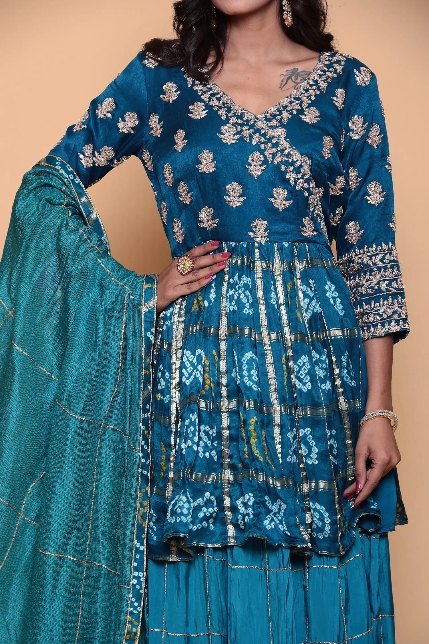 Bandhej ghatchola peplum kurta with skirt and zardozi embroidery.